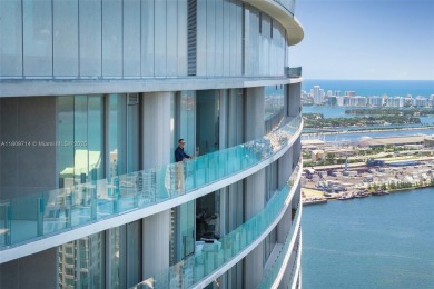 Rising 52 stories above Miami, this move-in ready 1,699 SF