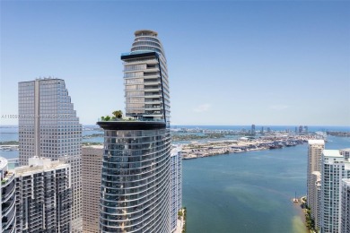 Rising 52 stories above Miami, this move-in ready 1,699 SF