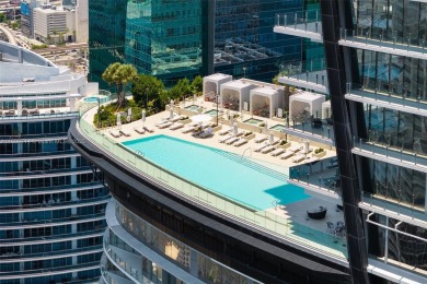 Rising 52 stories above Miami, this move-in ready 1,699 SF