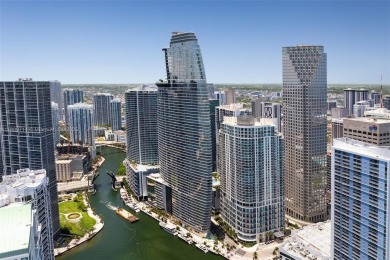 Rising 52 stories above Miami, this move-in ready 1,699 SF