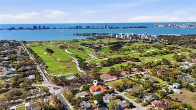 Nestled within the golf course community of Belleair Country - photo 1
