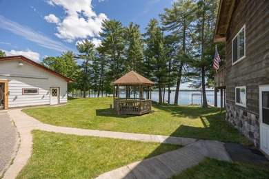 Woman Lake living begins with 150 feet of shoreline, a sandy - photo 4