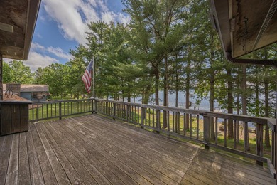 Woman Lake living begins with 150 feet of shoreline, a sandy - photo 6
