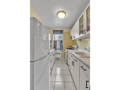 Welcome to this exceptional 2-bedroom, 1.5-bathroom coop located - photo 8