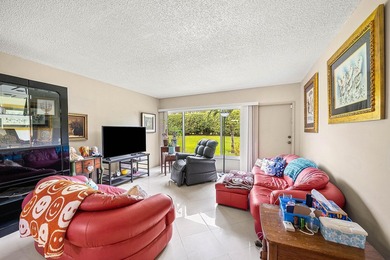 Tucked away as a private end-unit in desirable Town Villas, this - photo 13