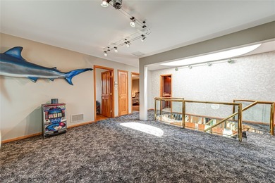 This expansive 4,937-square-foot residence is situated on a - photo 14