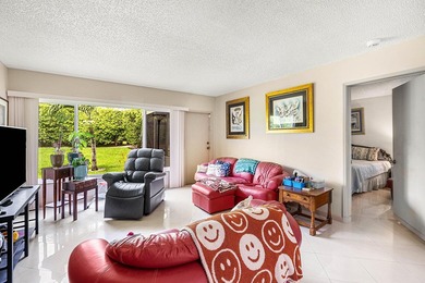 Tucked away as a private end-unit in desirable Town Villas, this - photo 14