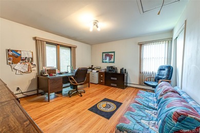 This expansive 4,937-square-foot residence is situated on a - photo 19