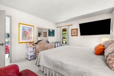 Tucked away as a private end-unit in desirable Town Villas, this - photo 20