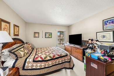 Tucked away as a private end-unit in desirable Town Villas, this - photo 22