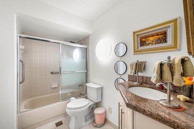 Tucked away as a private end-unit in desirable Town Villas, this - photo 24