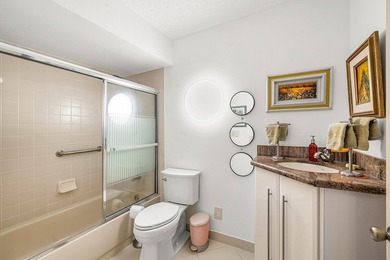 Tucked away as a private end-unit in desirable Town Villas, this - photo 25