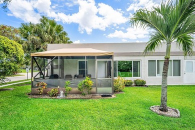 Tucked away as a private end-unit in desirable Town Villas, this - photo 29