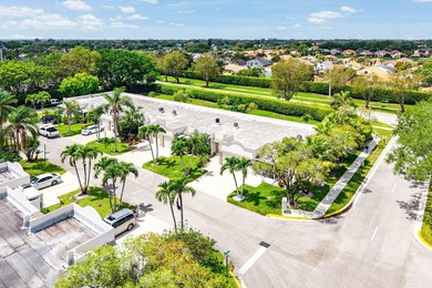 Tucked away as a private end-unit in desirable Town Villas, this - photo 34