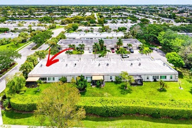Tucked away as a private end-unit in desirable Town Villas, this - photo 38