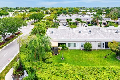 Tucked away as a private end-unit in desirable Town Villas, this - photo 41