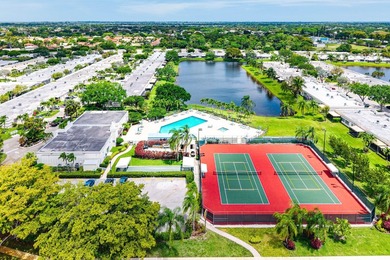 Tucked away as a private end-unit in desirable Town Villas, this - photo 44