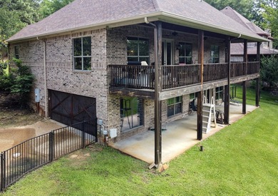 This beautifully-crafted waterfront property resides on Lake - photo 4