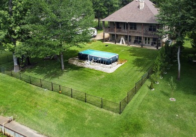 This beautifully-crafted waterfront property resides on Lake - photo 6