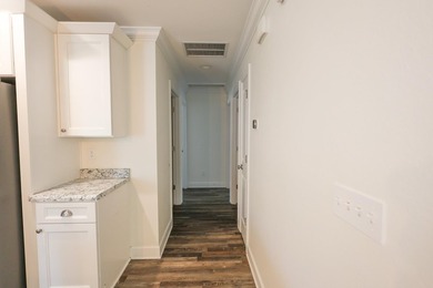 Welcome to this inviting 4-bedroom, 2-bathroom residence - photo 8
