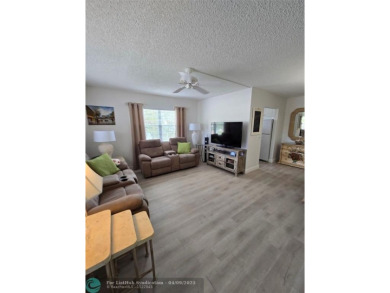 Lake Condo For Sale in Deerfield Beach, Florida