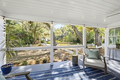 RARE FIND - Hidden beneath a canopy of majestic live oaks draped - photo 6