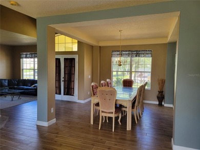 This beautiful property features an open floor plan and high - photo 20