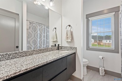 Stunning full brick home built in 2021 with 4 beds, 3 baths and - photo 32