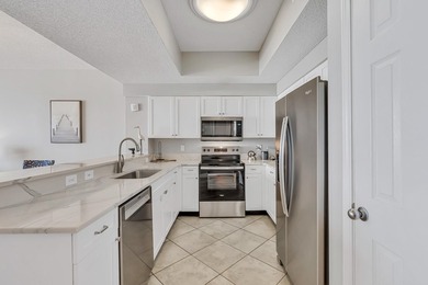 UPDATED CONDO located at Majestic Sun with direct garage access