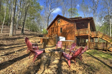 Situated on 1.9 private acres, this furnished mountain home - photo 12
