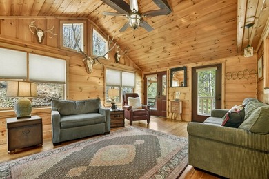 Situated on 1.9 private acres, this furnished mountain home - photo 21