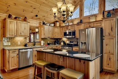 Situated on 1.9 private acres, this furnished mountain home - photo 26