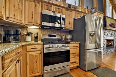 Situated on 1.9 private acres, this furnished mountain home - photo 28