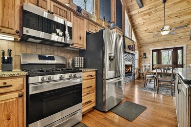 Situated on 1.9 private acres, this furnished mountain home - photo 29
