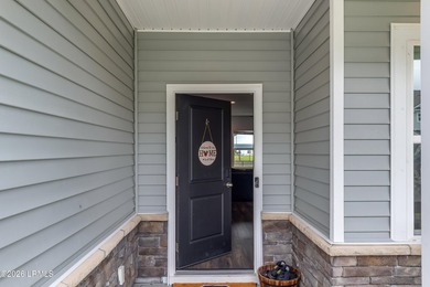 Welcome to this stunning Lowcountry gem in the highly - photo 3