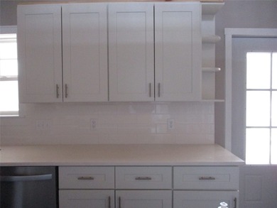 The builder has adorned this new home with high end features and - photo 8
