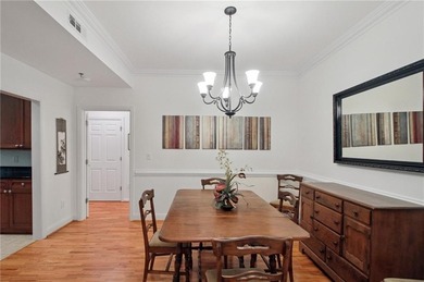 Truly a rare find, this stepless first-floor 2 bed, 2 bath condo