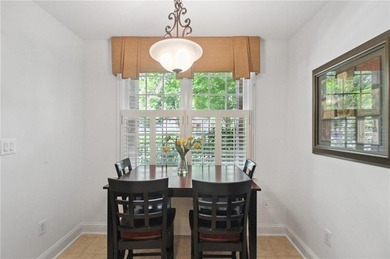 Truly a rare find, this stepless first-floor 2 bed, 2 bath condo