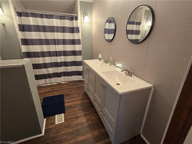 This spacious home with an acre lot and no neighbors close by