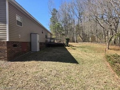 This spacious home with an acre lot and no neighbors close by