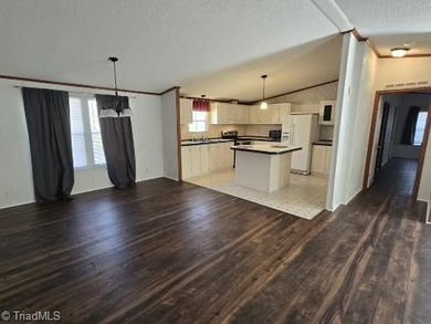 This spacious home with an acre lot and no neighbors close by