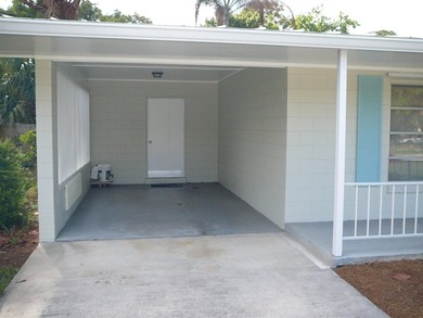 BEAUTIFUL 2/2 WITH CARPORT, CONCRETE BLOCK, NEW METAL ROOF AND - photo 11