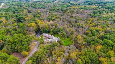 Exceptional Private Estate on 49 Pristine Wooded Acres Featuring - photo 2