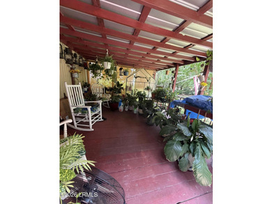 ATTENTION ALL CASH BUYERS! Welcome to this 3-bed, 2-bath 1991 - photo 9