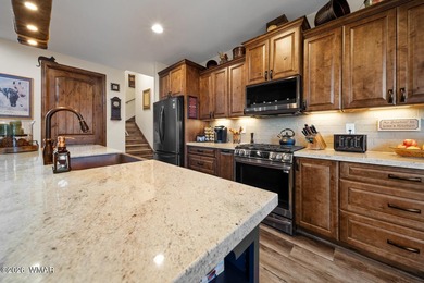Nestled among towering ponderosa pines on two lots in the - photo 15