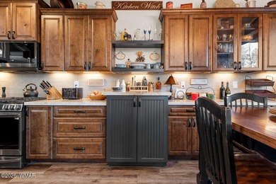 Nestled among towering ponderosa pines on two lots in the - photo 16