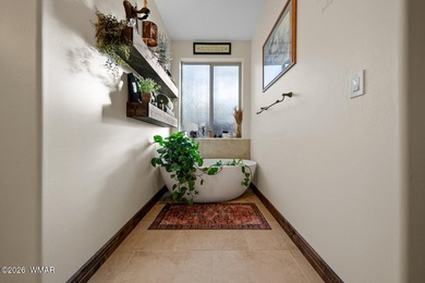 Nestled among towering ponderosa pines on two lots in the - photo 23
