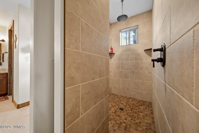 Nestled among towering ponderosa pines on two lots in the - photo 24