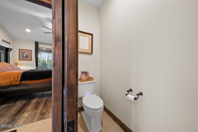 Nestled among towering ponderosa pines on two lots in the - photo 27