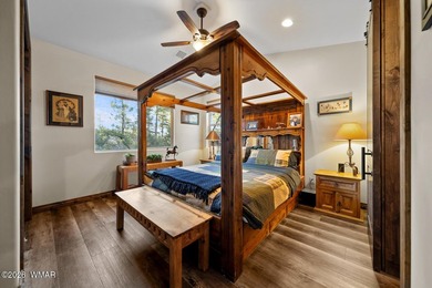 Nestled among towering ponderosa pines on two lots in the - photo 33